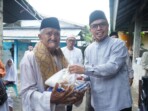 Bupati Boltara Sirajudin Lasena Berikan Bantuan kepada warga